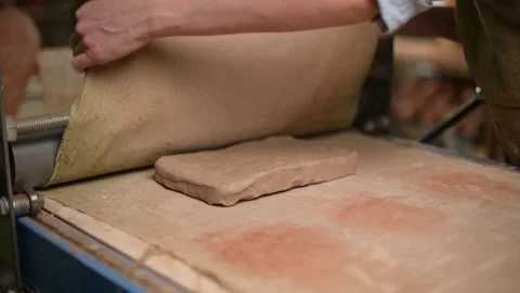 Master ceramist works in pottery studio. Process of creating plate 動画素材 170603816