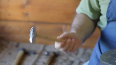 Master chaser turns a hammer Video stock 94496355