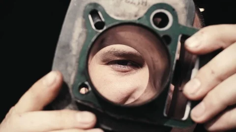 Master checks the status of the cylinder in the engine block Stock Footage 95998194