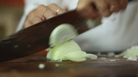 Master chef cutting a onion with knife skills Stock Footage 59887588