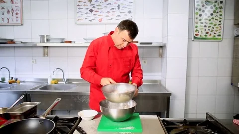 Master Chef Sifts Flour For Making Dough For Pancake, crepe Stock Footage 83643803