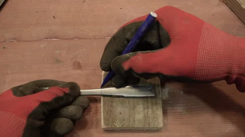 The master circles the prepared iron part with a marker. Stock Footage 156179311