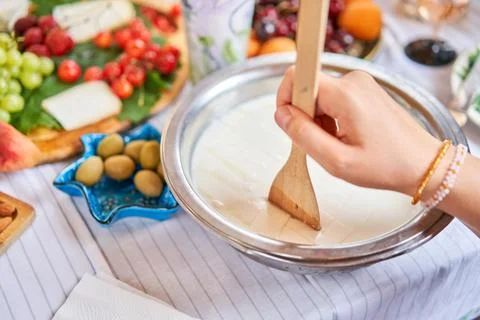 Master class and cheese tasting. Women make cheese. The enzyme and starter Stock Photos