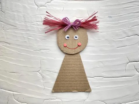 Master class - doll made of cardboard, kids crafts. Stock Photos