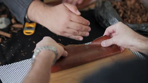 Master class on hand rolling cigars Stock Footage 317563992