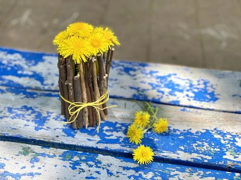 Master class, how to make a vase from sticks and tin cans, kids craft Stock Photos