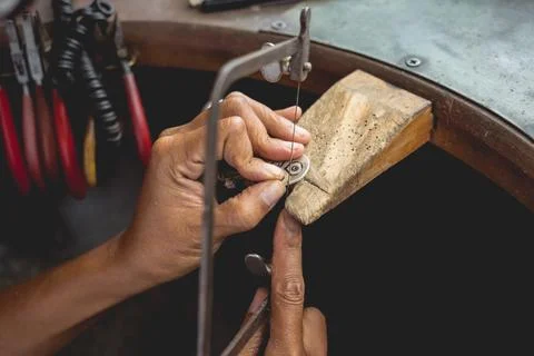 Master class in a large workshop for the manufacture of handmade jewelry Stock Photos