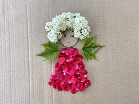 A master class made of natural material, a doll. Kids craft. Stock Photos