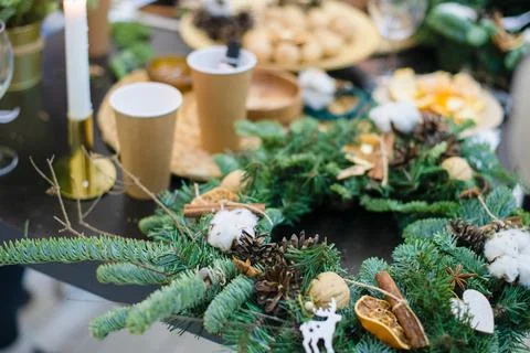 Master class on making and decorating Christmas wreaths from live spruce. The Stock Photos