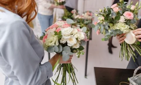 Master class on making bouquets. Spring bouquet. Learning flower arranging Stock Photos
