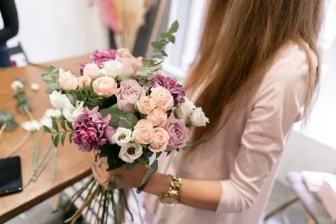 Master class on making bouquets. Summer bouquet. Learning flower arranging Stock Photos
