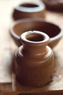 Master class on modeling of clay on a potter's wheel In the pottery workshop Stock Photos
