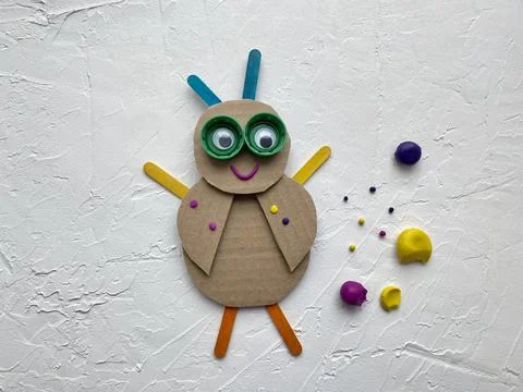 Master class training application made of cardboard cute bug. Stock Photos