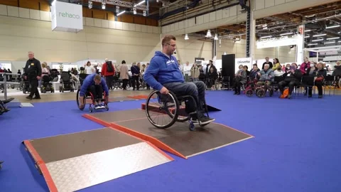 Master class on using a wheelchair Stock Footage 194431593