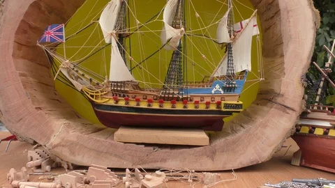 The master collects a model of a sailing ship. Stock Footage 117285236