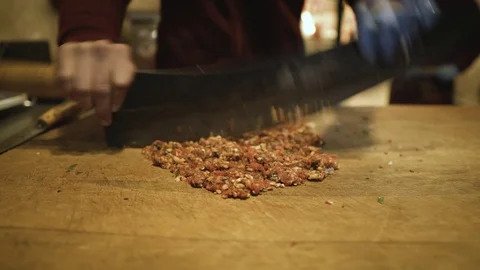 Master cook cutting meat Stock Footage 106771119