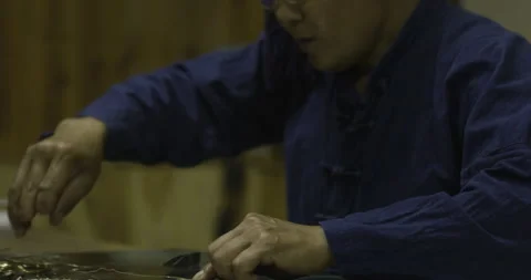 Master craftsman shutting silver hand made flower Stock Footage 141358124