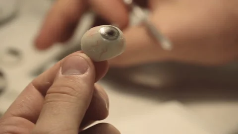 The master creates an eye prosthesis Stock Footage 157508151