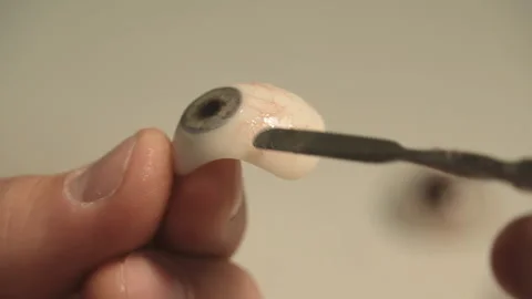 The master creates an eye prosthesis Stock Footage 157508152