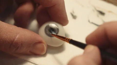 The master creates an eye prosthesis Stock Footage 157508221