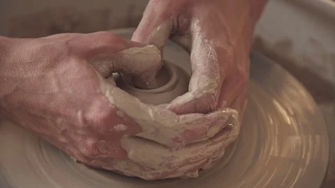 Master crock at the creative process in studio. Twisted potter's wheel Video stock 83460265