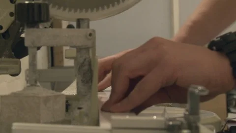 The master cuts the profile, using special saws Stock Footage 75157090