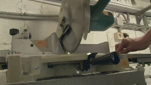 The master cuts the profile, using special saws Stock Footage 75157219