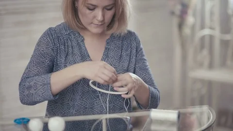 Master decotaror makes new Dreamcatcher in art studio Video stock 72959522