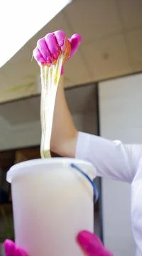 Master of depilation sugaring Stock Photos