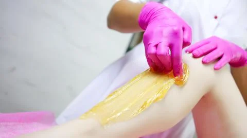 Master of depilation sugaring Stock-Fotos