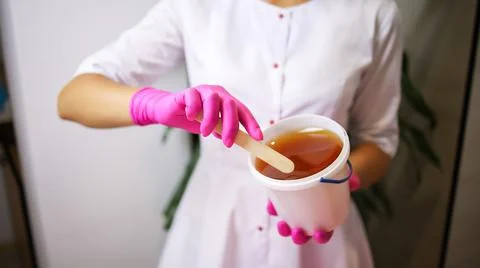 Master of depilation sugaring Stock-Fotos