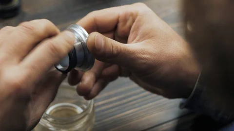 Master develops focus inside the lens after lubrication. repair of an old lens Video stock 119731492