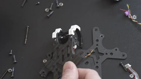 Master disassembles the FPV drone on the table Stock Footage 149774200