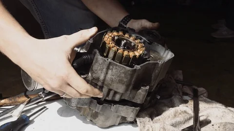 Master disassembles the motorcycle engine Stock Footage 95998147