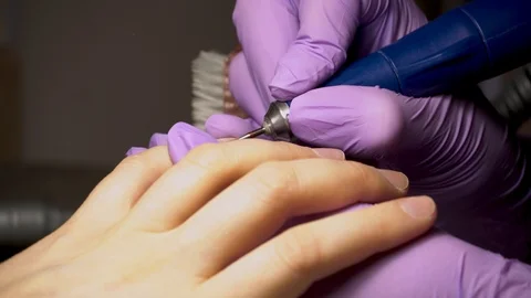 The master does hardware manicure in the beauty salon.Close-up. Stock Footage 102536723