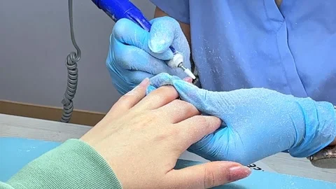  Master does a Hardware Manicure in Protective Gloves  Stock Footage 270175257