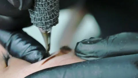 Master does tattoo of eyebrows close-up Video stock 76666178