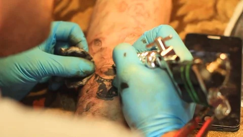 The master does the tattoo Stock Footage 77412914
