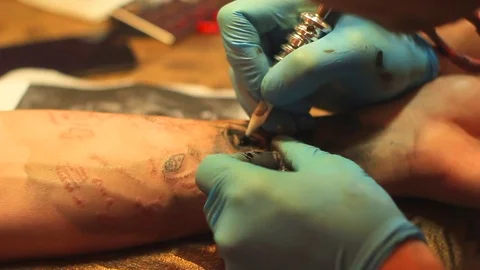 The master does the tattoo Stock Footage 77413307