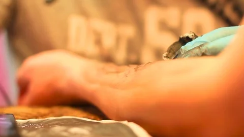The master does the tattoo Stock Footage 77414359