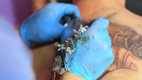 The master does the tattoo Stock Footage 77825146