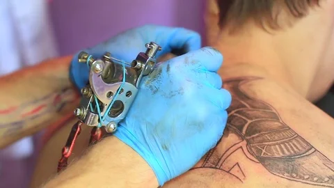 The master does the tattoo Stock Footage 77825193