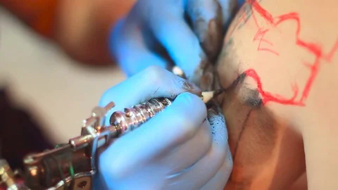 The master does the tattoo Stock Footage 78259817