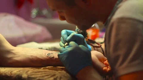 The master does the tattoo Stock Footage 78260541