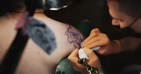 Master Doing Tattooing In Tattoo Studio. Stock Footage 133536729