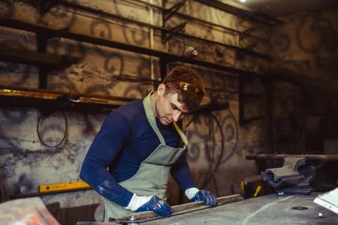 The master draws on the table Stock Photos