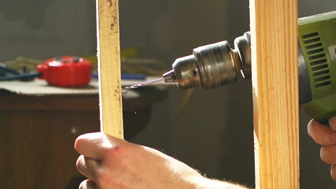Master drill wood lumber close up screw Stock Footage 104757887