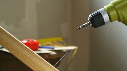 Master drill wood lumber close up screw Stock Footage 104758026