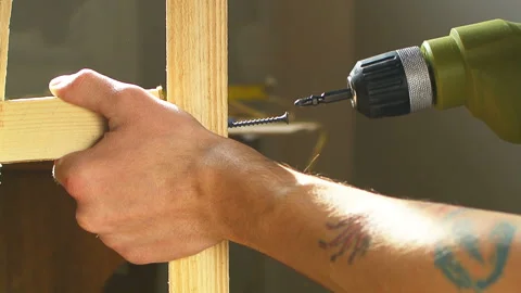 Master drill wood lumber close up screw Stock Footage 104758134