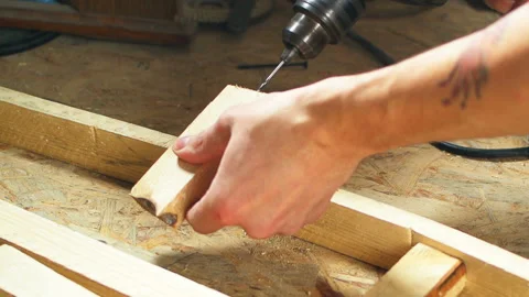 Master drill wood lumber close up screw Stock Footage 104758323